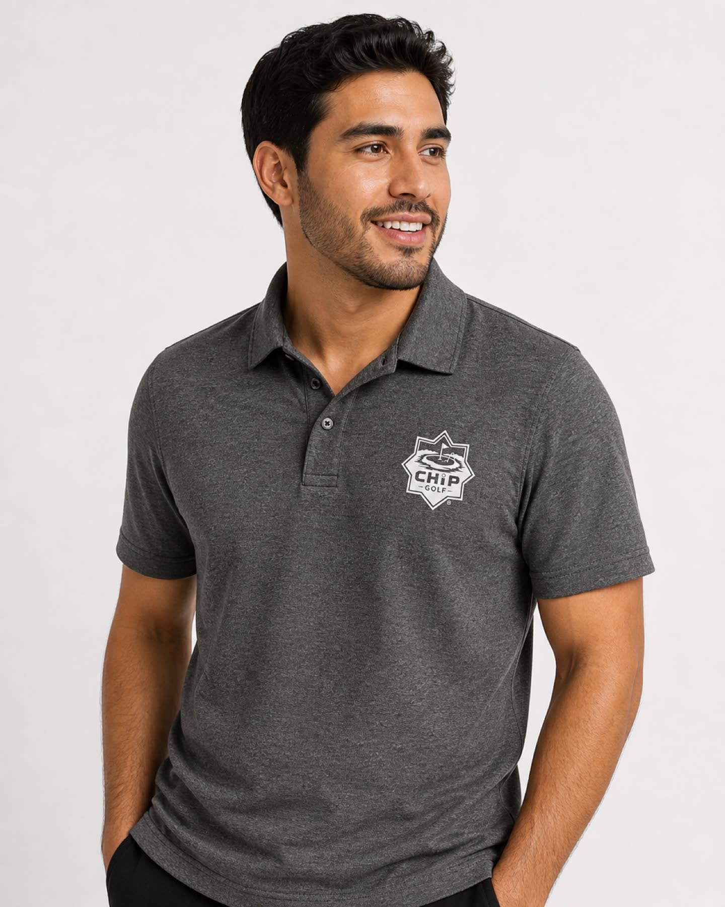 The Course Polo front view in charcoal
